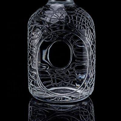 Glass Round Carved 700ml 750ml Vodka Glass Bottle Wine Bottle With Cork Sealing Type