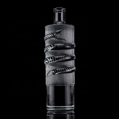 Customized Logo Clear 750ml Bar Top Emossed Snake Drawing Glass Bottle for Vodka Cylinder