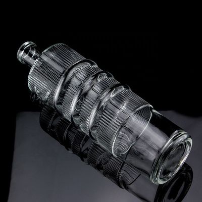 Customized Logo Clear 750ml Bar Top Emossed Snake Drawing Glass Bottle for Vodka Cylinder