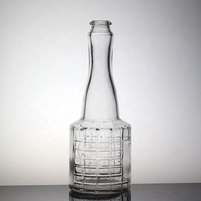 Customized Surface Handing Football Shaped Glass Bottle for Unique Alcohol Beverage