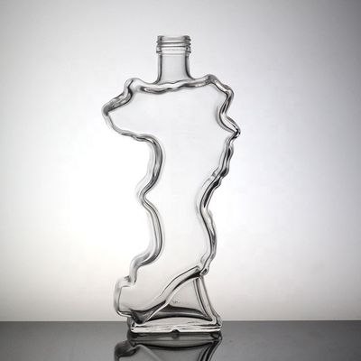 Customized Surface Handing Football Shaped Glass Bottle for Unique Alcohol Beverage