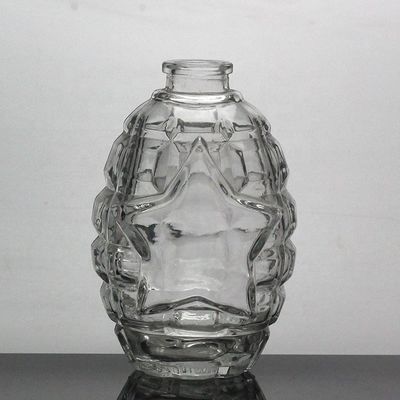 Customized Surface Handing Football Shaped Glass Bottle for Unique Alcohol Beverage