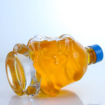 Decal Surface Skull Shape Glass Liquor Bottle for Whisky Vodka Brandy Aging Technique