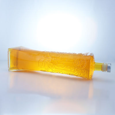 Industrial Liquor Glass Bottle with Unique Shape and Embossed Super Flint Material