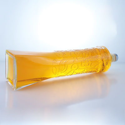 Industrial Liquor Glass Bottle with Unique Shape and Embossed Super Flint Material