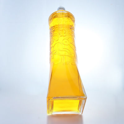 Industrial Liquor Glass Bottle with Unique Shape and Embossed Super Flint Material