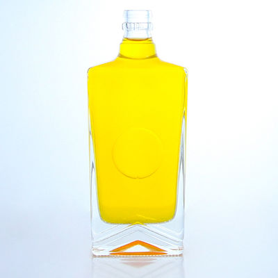 Industrial Liquor square glass bottle with guala cap and customizable capacity
