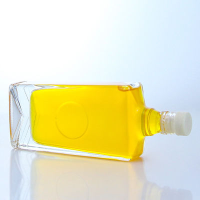 Industrial Liquor square glass bottle with guala cap and customizable capacity