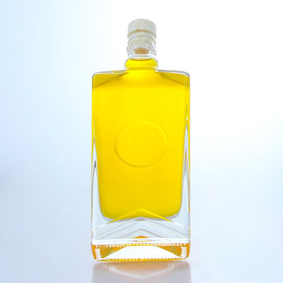 Industrial Liquor square glass bottle with guala cap and customizable capacity