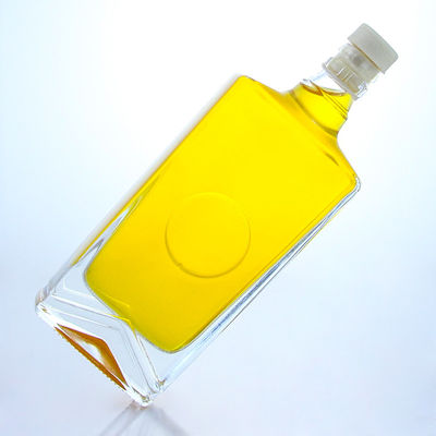 Industrial Liquor square glass bottle with guala cap and customizable capacity